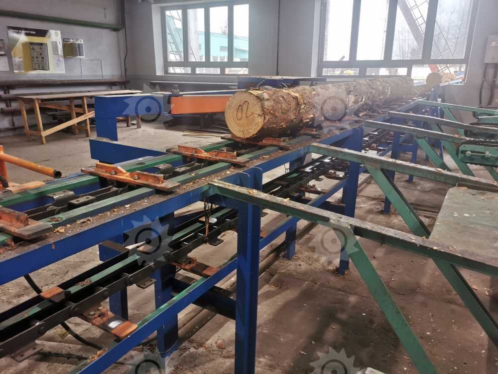 Сбрасыватель бревен механический